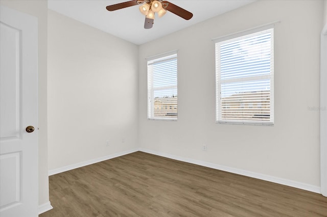 13758 Daniels Landing Cir, Winter Garden, FL 34787 - empty room featuring wood finished floors, ceiling fan, and baseboards