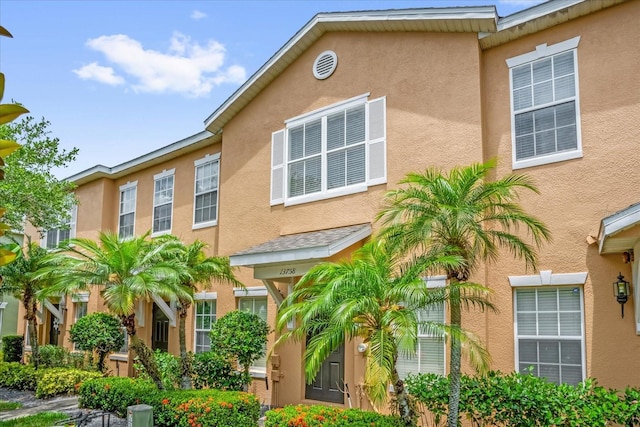 13758 Daniels Landing Cir, Winter Garden, FL 34787 - view of front of property featuring stucco siding