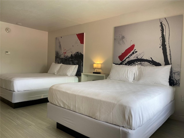 5245 W Irlo Bronson Memorial Hwy Unit 148, Kissimmee, FL 34746 - bedroom with wood finished floors
