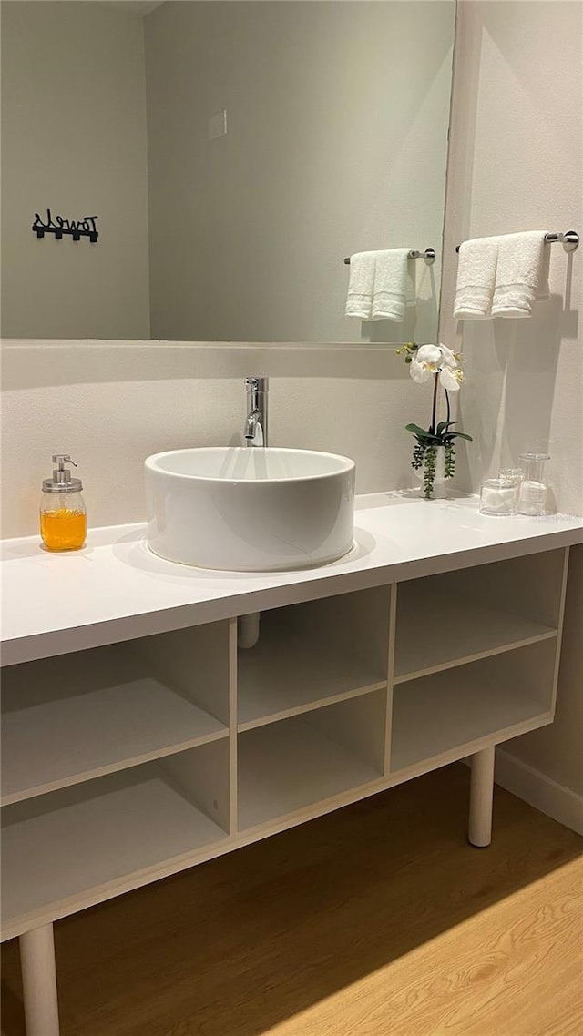 5245 W Irlo Bronson Memorial Hwy Unit 148, Kissimmee, FL 34746 - bathroom featuring wood finished floors and vanity