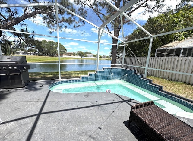 view of pool featuring grilling area, a patio, a water view, glass enclosure, and fence