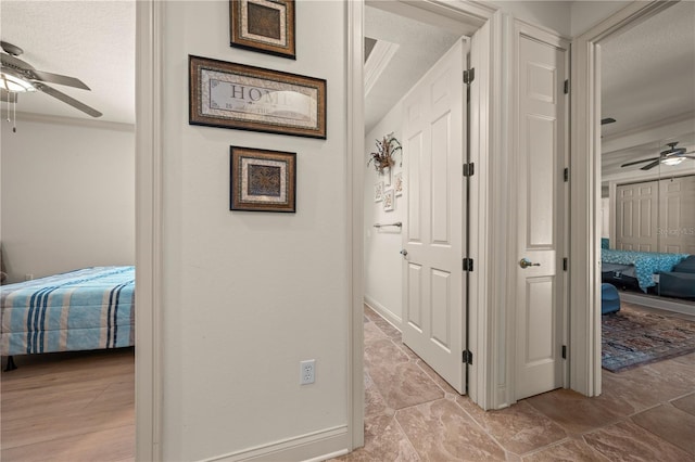 1654 Marina Lake Dr, Kissimmee, FL 34744 - hall with a textured ceiling and crown molding