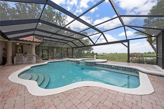 1654 Marina Lake Dr, Kissimmee, FL 34744 - view of pool featuring a patio, a pool with connected hot tub, and glass enclosure