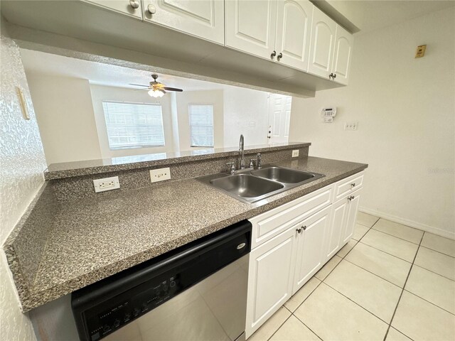 2330 Prime Cir Unit A, Kissimmee, FL 34746 - kitchen featuring stainless steel dishwasher, a sink, white cabinets, light tile patterned floors, and ceiling fan