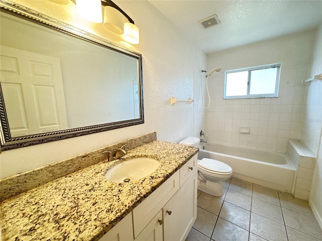 2330 Prime Cir Unit A, Kissimmee, FL 34746 - bathroom featuring shower / tub combination, toilet, vanity, and tile patterned floors