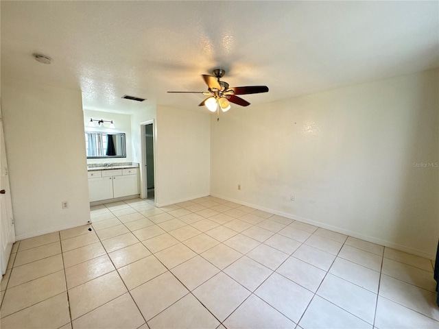 2330 Prime Cir Unit A, Kissimmee, FL 34746 - unfurnished room featuring ceiling fan, light tile patterned flooring, a smoke detector, and baseboards