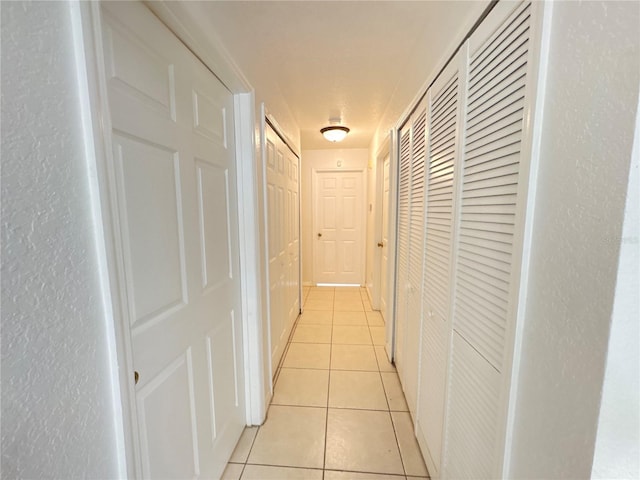2330 Prime Cir Unit A, Kissimmee, FL 34746 - hall with light tile patterned floors