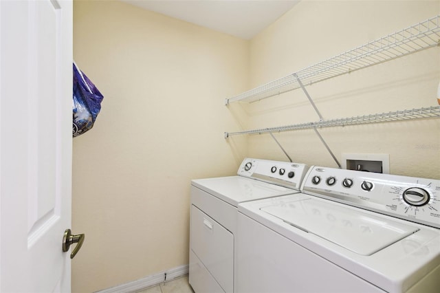 223 Cadiz Loop, Davenport, FL 33837 - washroom featuring washer and dryer and baseboards