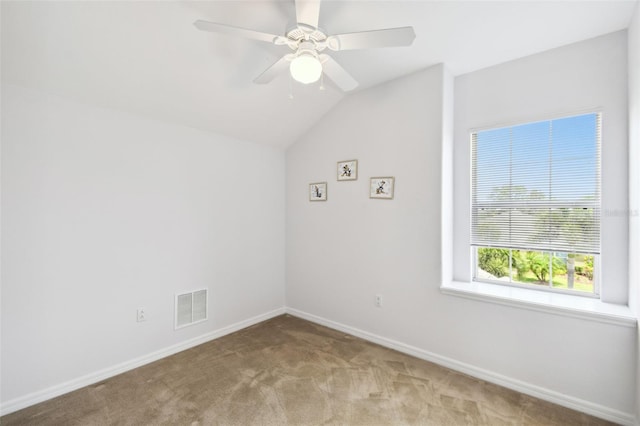 223 Cadiz Loop, Davenport, FL 33837 - carpeted empty room with baseboards, lofted ceiling, and ceiling fan