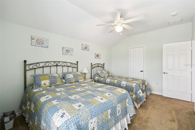 223 Cadiz Loop, Davenport, FL 33837 - carpeted bedroom with vaulted ceiling, baseboards, and a ceiling fan