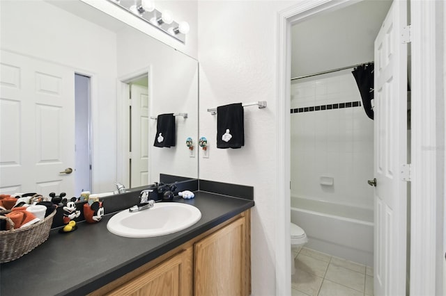 223 Cadiz Loop, Davenport, FL 33837 - bathroom with tile patterned flooring, vanity, toilet, and shower / tub combo