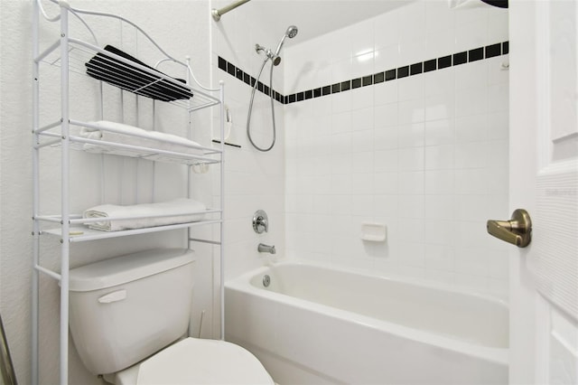 223 Cadiz Loop, Davenport, FL 33837 - bathroom featuring toilet and shower / bath combination