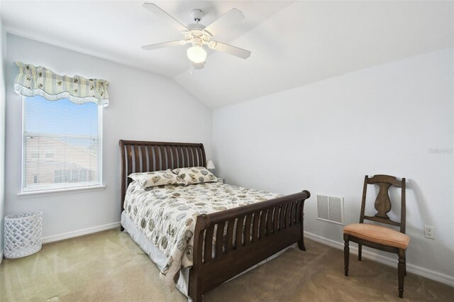 223 Cadiz Loop, Davenport, FL 33837 - bedroom featuring carpet, vaulted ceiling, baseboards, and a ceiling fan