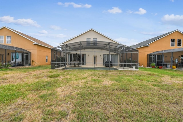 223 Cadiz Loop, Davenport, FL 33837 - rear view of house with a lawn, a lanai, a patio, and an outdoor pool