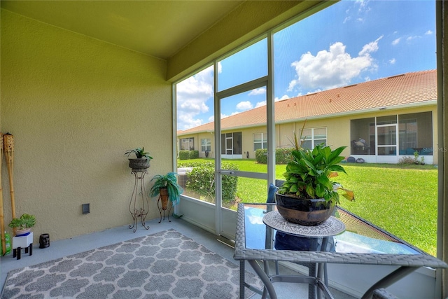 sunroom featuring healthy amount of natural light
