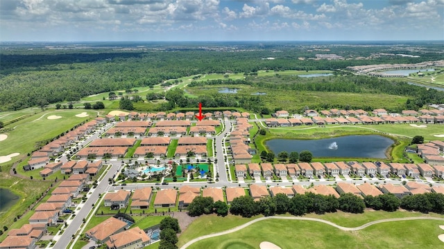 aerial view of property's location with a large body of water, nearby suburban area, and a local golf course