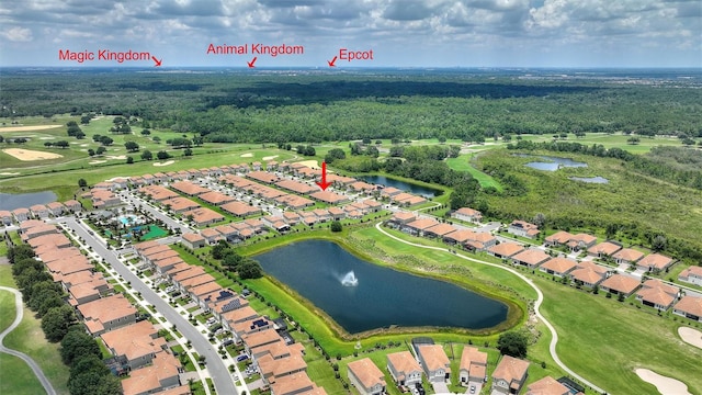 aerial view of property's location featuring a large body of water, a golf club, a forest, and nearby suburban area