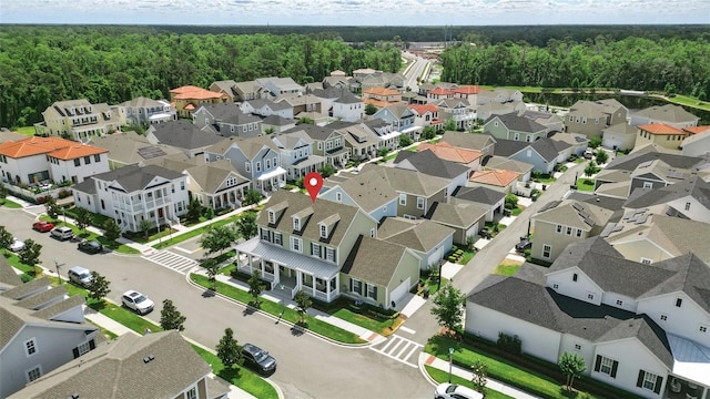 1850 Treasure Cv, Celebration, FL 34747 - aerial view of residential area with a heavily wooded area
