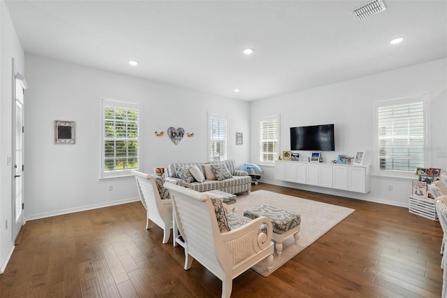 1850 Treasure Cv, Celebration, FL 34747 - living area featuring dark wood-type flooring, baseboards, and recessed lighting
