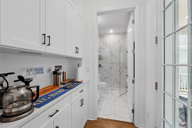 1850 Treasure Cv, Celebration, FL 34747 - bar with light marble finish floors