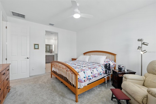 1850 Treasure Cv, Celebration, FL 34747 - carpeted bedroom with ceiling fan and connected bathroom