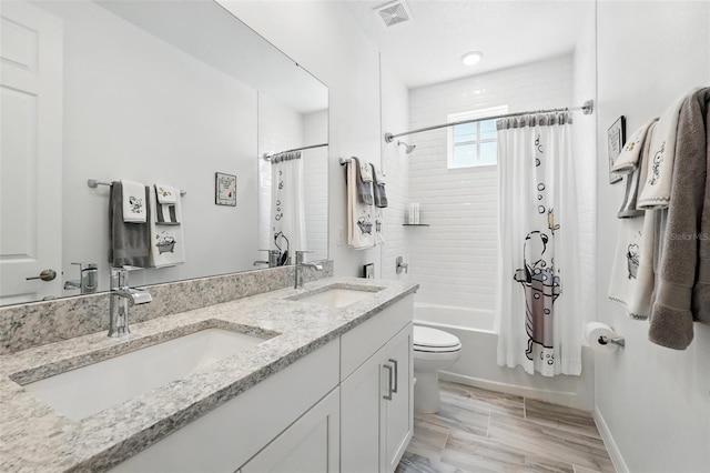 1850 Treasure Cv, Celebration, FL 34747 - full bathroom with toilet, shower / bathtub combination with curtain, and double vanity