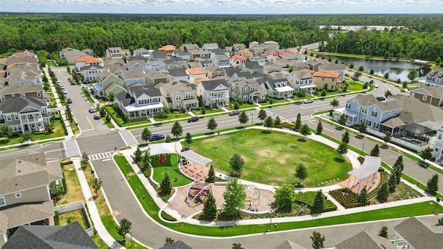 1850 Treasure Cv, Celebration, FL 34747 - aerial view of residential area featuring a forest and a nearby body of water