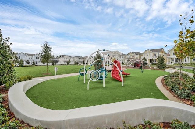 1850 Treasure Cv, Celebration, FL 34747 - community playground featuring a residential view and a lawn
