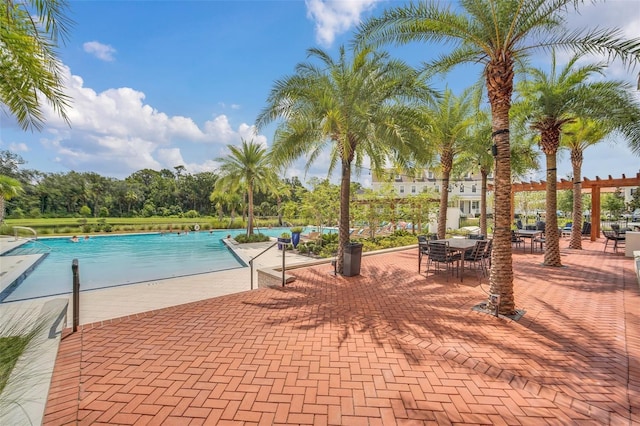 1850 Treasure Cv, Celebration, FL 34747 - community pool featuring a patio area
