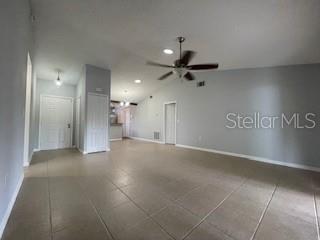 116 Talavera Ln, Kissimmee, FL 34758 - spare room featuring ceiling fan and baseboards