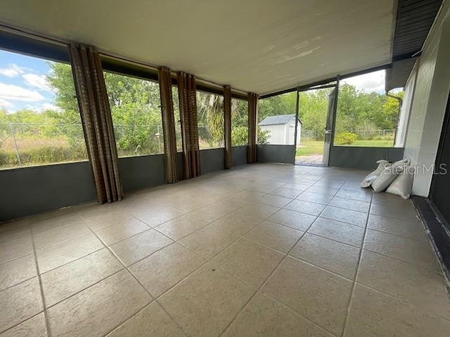 116 Talavera Ln, Kissimmee, FL 34758 - view of unfurnished sunroom