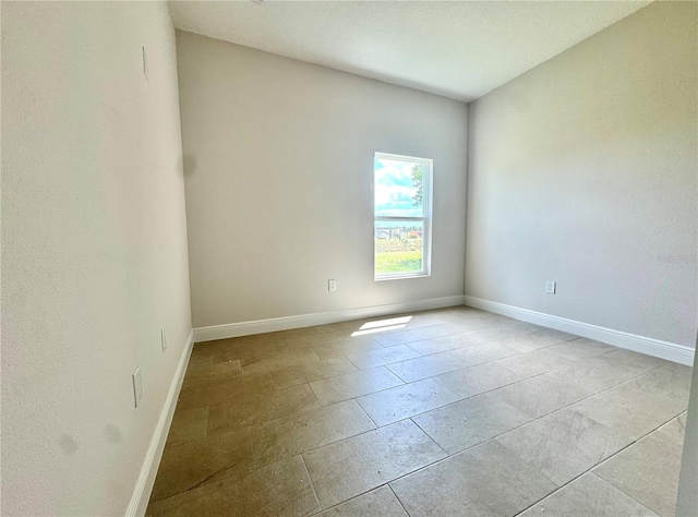 2427 Continental Blvd, Orlando, FL 32808 - empty room with baseboards