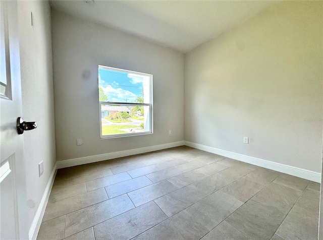 2427 Continental Blvd, Orlando, FL 32808 - unfurnished room with tile patterned flooring and baseboards