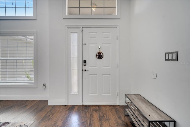 149 Imperial Oak Ct, Davenport, FL 33896 - foyer with dark wood-style flooring and baseboards