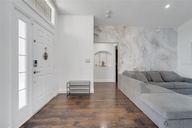 149 Imperial Oak Ct, Davenport, FL 33896 - entrance foyer with dark wood-style floors, healthy amount of natural light, baseboards, recessed lighting, and an accent wall