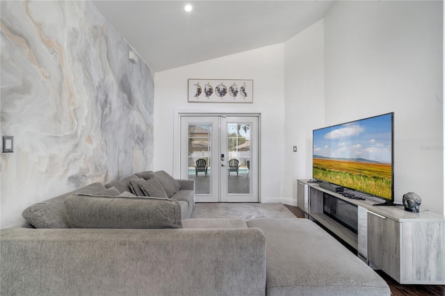 149 Imperial Oak Ct, Davenport, FL 33896 - living area featuring lofted ceiling, french doors, and baseboards