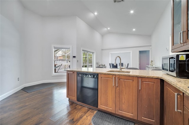 149 Imperial Oak Ct, Davenport, FL 33896 - kitchen featuring dishwasher, a sink, light stone counters, stainless steel microwave, and dark wood-style floors