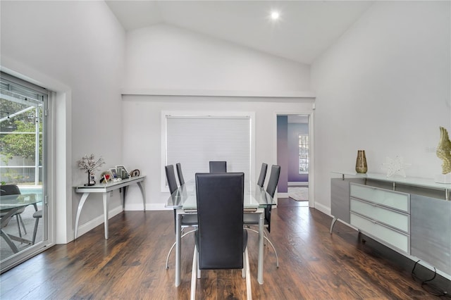 149 Imperial Oak Ct, Davenport, FL 33896 - dining room with wood finished floors, baseboards, and high vaulted ceiling