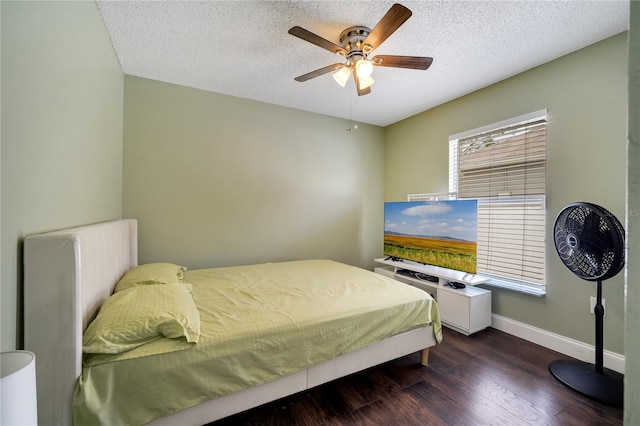 149 Imperial Oak Ct, Davenport, FL 33896 - bedroom featuring wood finished floors, a textured ceiling, baseboards, and ceiling fan