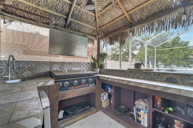 149 Imperial Oak Ct, Davenport, FL 33896 - view of patio featuring a sink and an outdoor kitchen