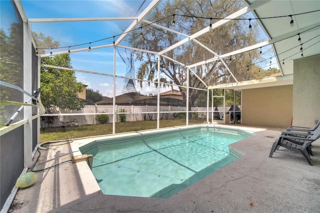 149 Imperial Oak Ct, Davenport, FL 33896 - view of swimming pool with a patio area, a fenced backyard, and glass enclosure