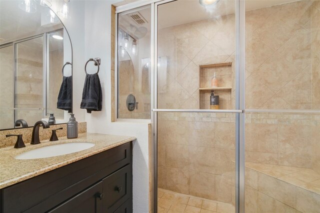 102 Royalty Cir, Sanford, FL 32771 - bathroom featuring vanity and a stall shower