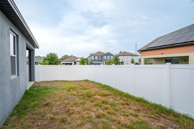 view of yard featuring a residential view