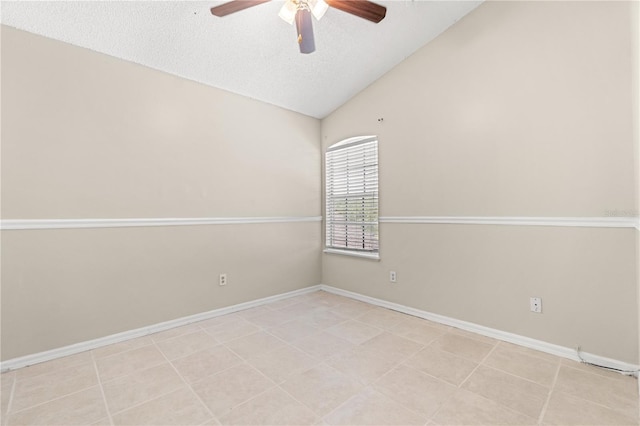 unfurnished room featuring ceiling fan, a textured ceiling, baseboards, and high vaulted ceiling