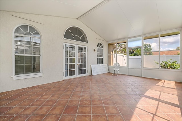 unfurnished sunroom with french doors