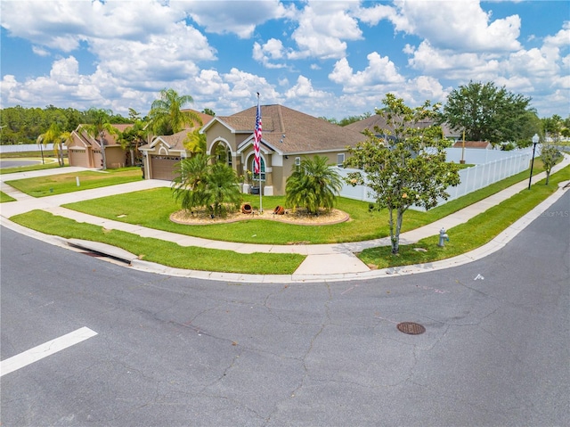 view of front of house featuring driveway and a garage