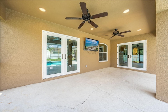 view of patio / terrace featuring french doors and a ceiling fan