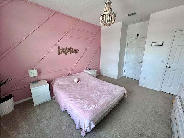 2691 Cypress Tree Trl, Saint Cloud, FL 34772 - bedroom featuring a chandelier, carpet floors, and baseboards