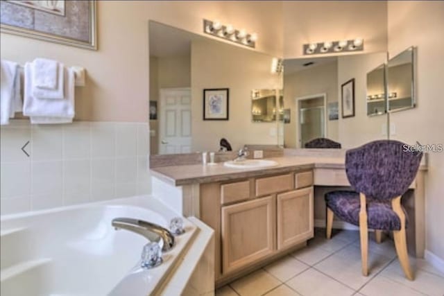 214 Tupelo Cir, Davenport, FL 33897 - bathroom featuring a bath, tile patterned floors, and vanity