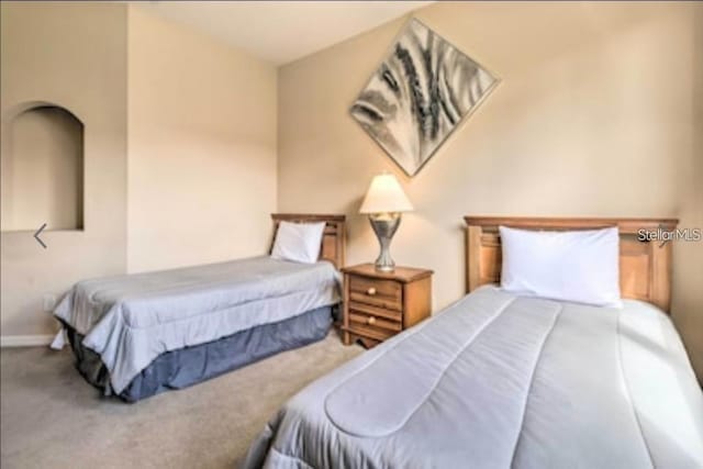 214 Tupelo Cir, Davenport, FL 33897 - bedroom featuring carpet flooring and baseboards